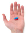 © voren1 - Hand with red and blue capsule.