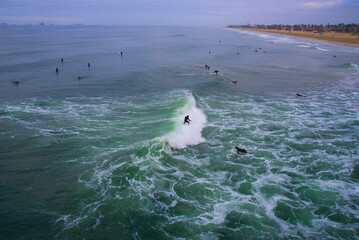 Wall Mural - Surfing in Winter - California.