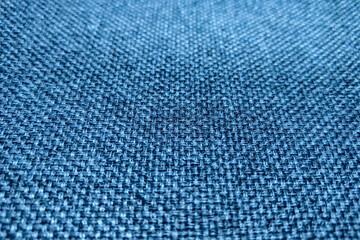 Closeup on blue fabric, material, background, pattern.