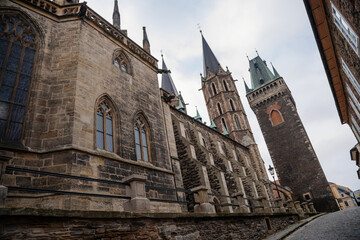 Medieval stone St. Bartholomew´s Church in autumn day, arched windows, chimeras and gargoyles, Gothic Cathedral with belfry in Kolin, Central Bohemia, Czech republic