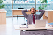 © Elnur - Young male employee working in the office
