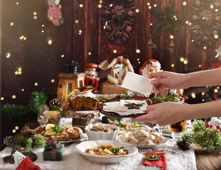 sharing Christmas Eve wafer at the festive table