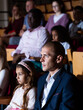 © JackF - Family viewing of spectacle or concert in the theater auditorium