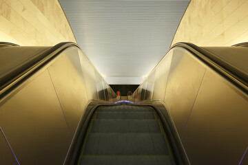 Wall Mural - modern escalator abstract background, blurred light background geometry transport