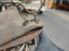 Close-up Of An Old Bicycle Saddle Broken