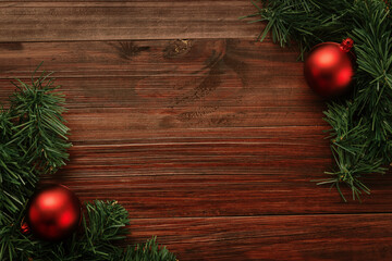 Wall Mural - christmas and new year with red balls decoration on wooden table background top view with copy space