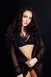 © dmitriisimakov - Beautiful fashionable brunette woman in black lingerie