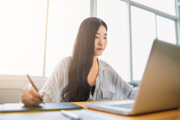 Fototapete - Asian woman Graphic Design Studio Drawing Ux Ui Website Technology Creative Occupation freelance advertisement marketing creating user interface with tablet computer agency working happy smiling