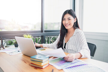 Fototapete - Asian woman Graphic Design Studio Drawing Ux Ui Website Technology Creative Occupation freelance advertisement marketing creating user interface with tablet computer agency working happy smiling