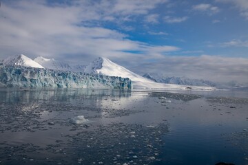 lilliehöökbreen glacier, spitsbergen / svalbard during a cruise on an old sail ship early spring whe