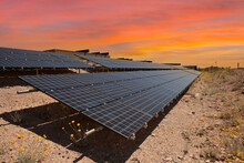 Photovoltaic Solar Panels With Sunset Sky At Red Rock Canyon National Conservation Area Park In Southern Nevada, USA.