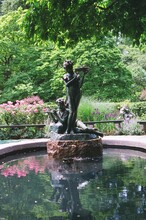 Statue And Fountain In Summer