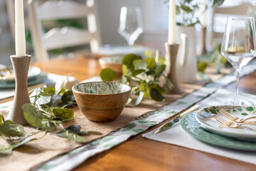 Wall Mural - Beautiful holiday table setting in greens and gold