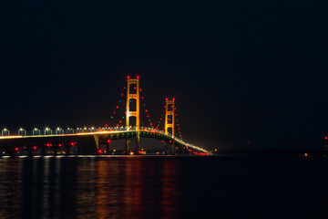 The longest suspension bridge in the world opened on November 1, 1957.  The Mackinaw Bridge is just under five miles long.  It connects Michigan's two peninsulas.