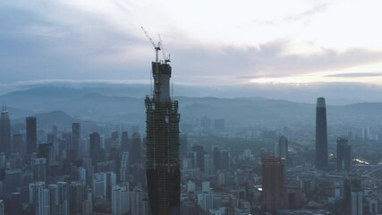 Wall Mural - Establishing aerial cinematic drone b-roll shot of sunrise at Kuala Lumpur city skyline