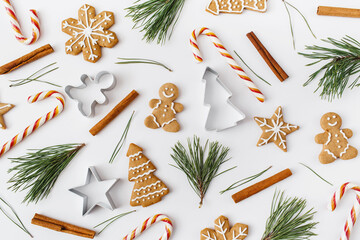 christmas, winter, new year composition. pattern made of fir tree branches, cinnamon sticks, candies