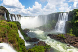 Natural landscape of Cataratas do Iguaçu, also know as Iguazu Waterfalls in the border of Brazil and Argentina. Devil's Throat water fall visible with huge flow of water from Paraná River. 