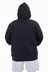 Canvas Print - Men's black hoodie mockup fashion shoot in studio