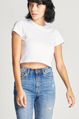 Poster - Women's sexy white crop top with high waisted jeans