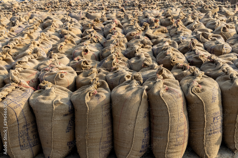 food grains filled in jute bag lying in grain market Stock Photo ...