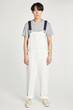 © Rawpixel.com - Man wearing white dungarees mockup