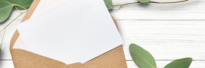 Wall Mural - white card mockup in a brown envelope website banner template