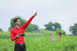 © PRASANNAPIX - Young indian agronomist controlling of flying drone at agriculture field