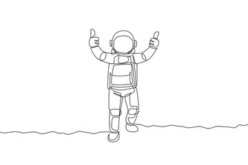 Poster - One continuous line drawing young spaceman on spacesuit giving thumbs up gesture in moon surface. Astronaut business office with deep space concept. Single line draw design graphic vector illustration