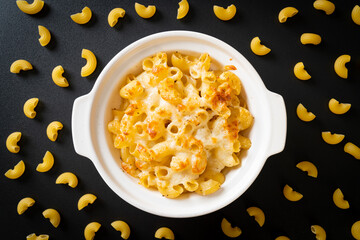 Wall Mural - American mac and cheese, macaroni pasta in cheesy sauce