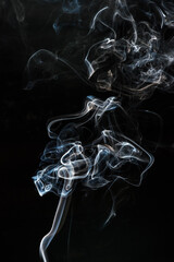 white smoke on a dark background