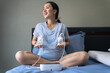 Mom use electric breast pump feeding for her baby.