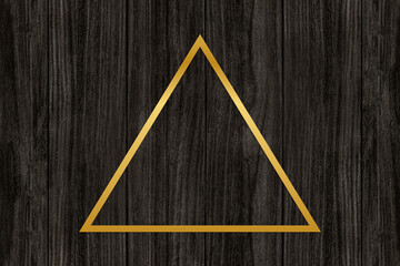 Poster - Gold triangle frame on a wooden background