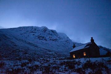 Canvas Print - House covered with snow on a misty day