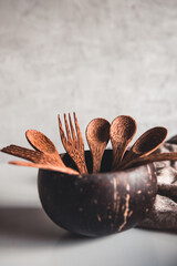 Coconut dishes. Bowl, fork and spoon from coconuts shell