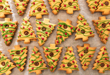 Freshly baked Christmas tree cookies made of gingerbread