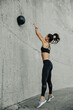 © Jacob Lund - Female athlete exercising with a medicine ball