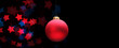 Red Christmas ball on black. Horizontal long background.