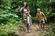 © BalanceFormCreative - Mother and her little sons hiking trough forest .Outdoor spring leisure concept.