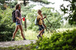 © BalanceFormCreative - Mother and her little sons hiking trough forest .Outdoor spring leisure concept.