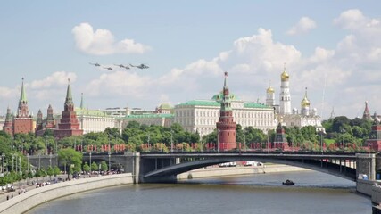 Sticker - MOSCOW, RUSSIA - JUN 24, 2020: Celebration of the 75th anniversary of the Victory Parade in Moscow. A group of helicopters flying over the Kremlin