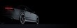 © Negro Elkha - Black matt sports car on elegant dark background.