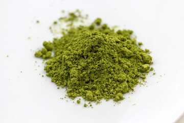 Japanese Matcha Tea Powder on Isolated White Background.	