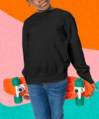 Young skateboarder in a black crewneck