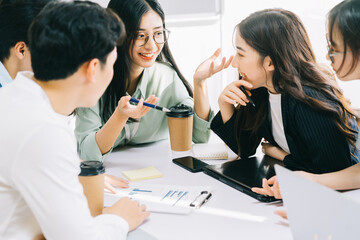 Sticker - The business team members are discussing next month's plans together