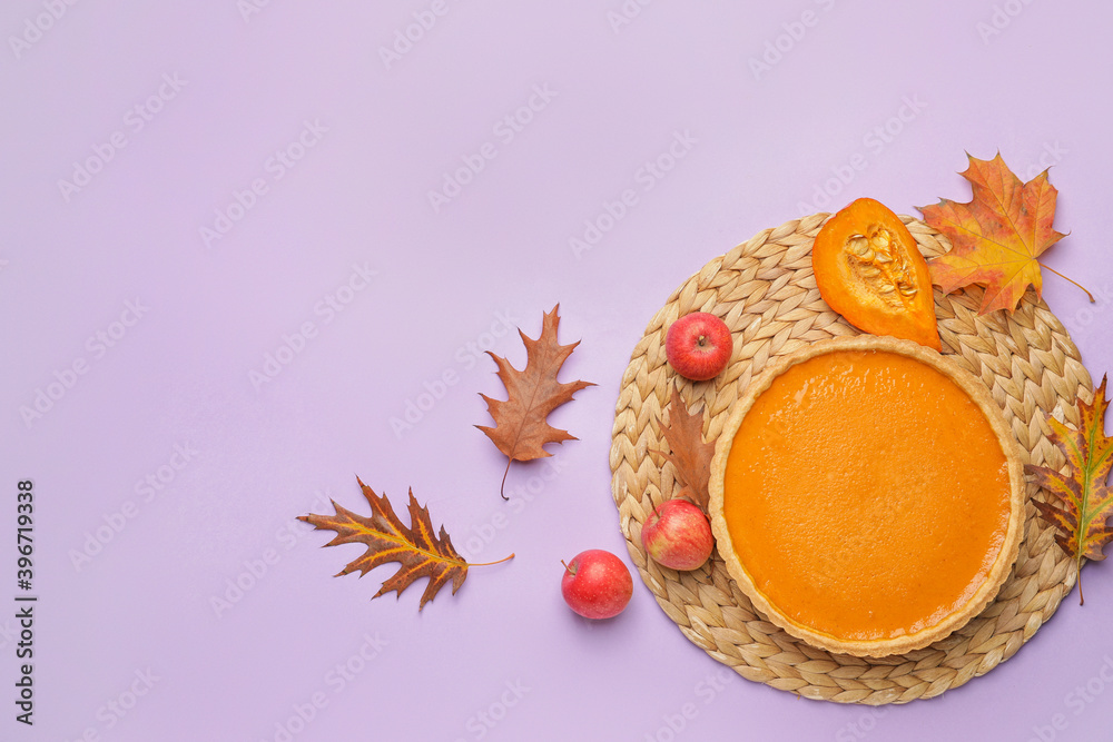Composition with tasty pumpkin pie on color background