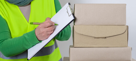 hand deliver worker delivery green vest gift box blank order form waybill