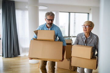 Sticker - Portrait of happy senior couple in love moving in new home