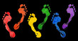 Human footprints LGBTQ community rainbow flag colors black background isolated, foot print diversity, LGBT people pride symbol, gay, lesbian etc sign, identity concept, bare foot footstep mark, logo