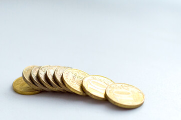 Wall Mural - Russian ten ruble coins on white background. Selective focus.