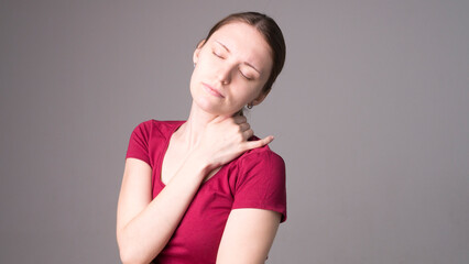 Canvas Print - Tired woman feeling pain, massaging tense muscles